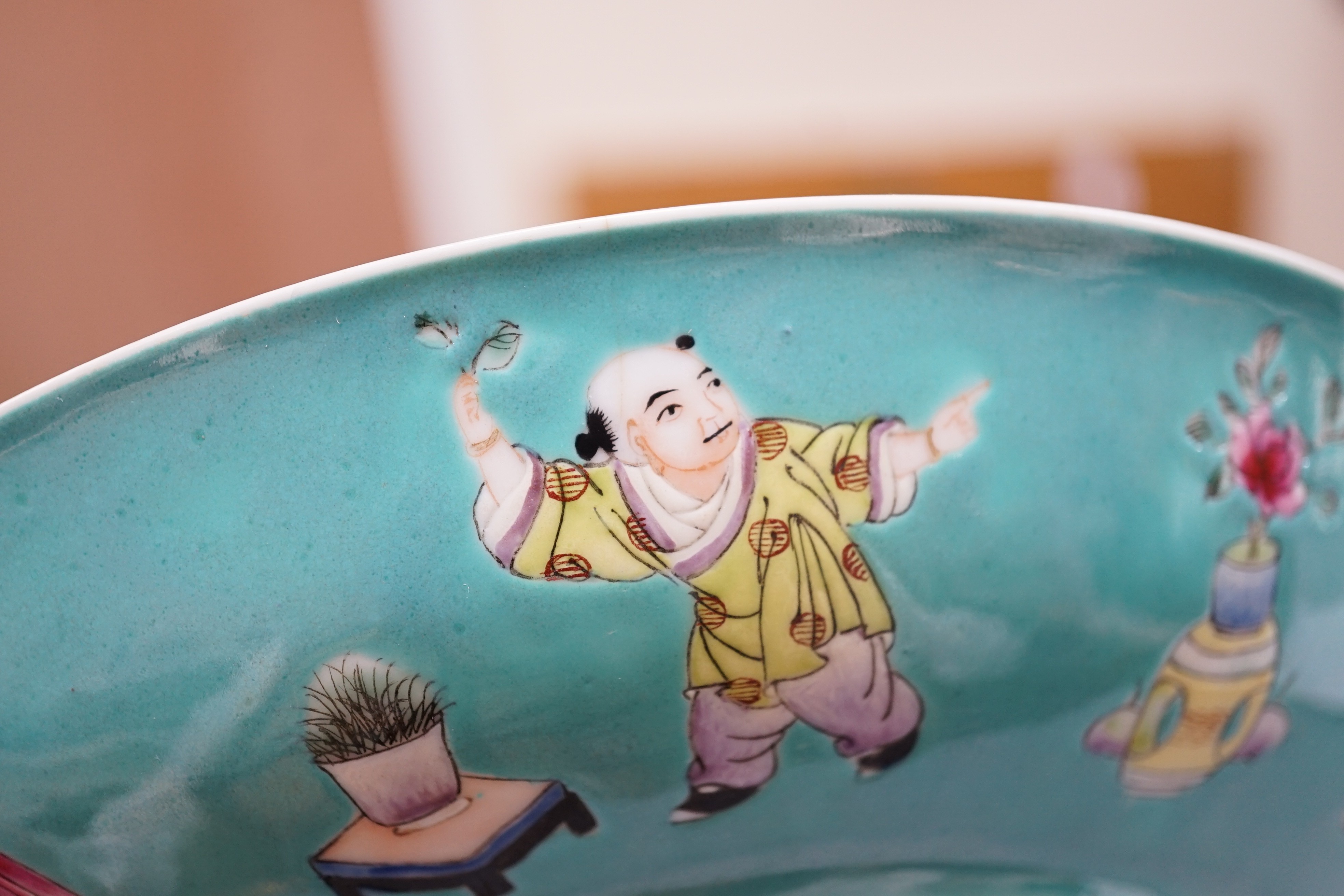 A Chinese turquoise ground 'Boys' dish, Jiaqing seal mark but Republic period, 23.5cm diameter, two hairline cracks